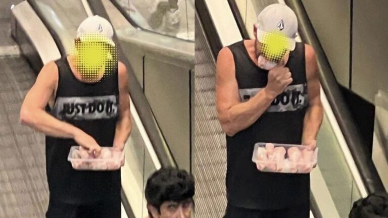 Shocking! Australian Man Spotted Eating Raw Chicken In Mall. Pics Go Viral