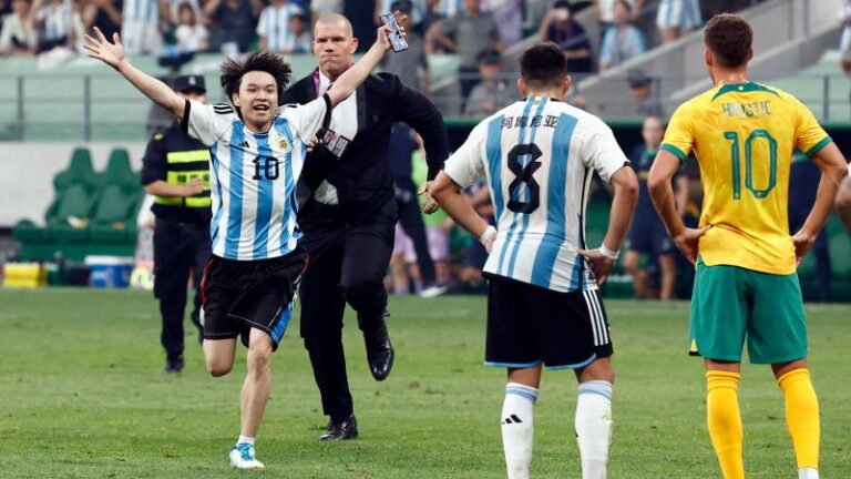 Lionel Messi: Young Chinese soccer fan gives security the slip to hug his hero Messi mid-game