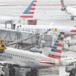 Airlines cancel thousands of flights as blizzard cripples East Coast airports