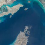 Video shows ships turning away from the Strait of Hormuz as confusion persists over whether sea lane is really open