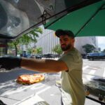 38-year-old runs a mobile pizzeria out of his Smart car in New York City: It's 'like a circus or a magic act'