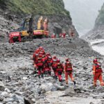 Nepal seeks technical help and billions of dollars for flood as bad weather hampers rescue