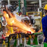 China's factory activity shrinks for second straight month, contracting less than expected