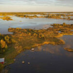 Finland's coast is still rising after the Ice Age; around the Gulf of Bothnia, 1,730 acres emerge each year, but waterfront owners may not own the new land