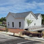 A Georgia city moved a pre-Civil War house out of the way of a hotel project instead of demolishing it; after a $500,000 relocation and restoration, it is becoming a coffee shop
