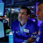 S&P 500 falls, weighed down by oil prices; Nasdaq craters as AI stocks falter: Live updates